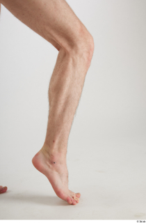 Tony  1 calf flexing nude side view 0006.jpg